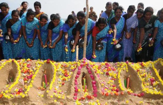 Hundreds of people living in Tamil Nadu's coastal districts on Monday paid homage to those who were swallowed by the 2004 tsunami on this day. 2004 Tsunami Victims,2004 Tsunami,Tsunami Victims,Tsunami,homage to Tsunami Victims