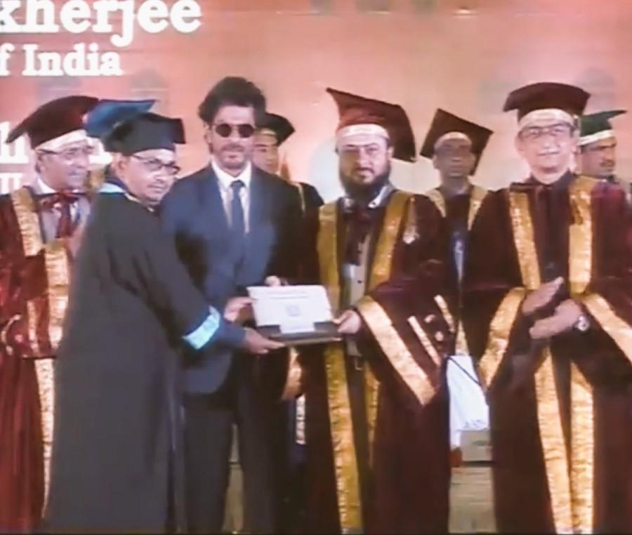 Indian film superstar Shah Rukh Khan on Monday received an honorary doctorate from Maulana Azad National Urdu University (MANUU) here for his extraordinary contribution in promotion of te Urdu language and culture through his films. Shahrukh Khan,SRK,Shahrukh Khan receives Doctorate,SRK receives Doctorate,Maulana Azad University,Maulana Azad National Urdu University