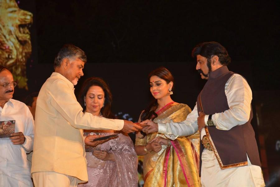 Nandamuri Balakrishna's Gautamiputra Satakarni audio launch event held at Tirupathi Municipal High School Grounds on December 26, 2016. Celebs like Nandamuri Balakrishna, Shriya Saran, Hema Malini, Venkaiah Naidu, Chandrababu Naidu, Bibo Srinivas, Krish, Y. Rajeev Reddy, Saibabu Jagarlamudi, Sai Madhav Burra, Suhasini Panguluri and others graced the event. Nandamuri Balakrishna,Gautamiputra Satakarni,Gautamiputra Satakarni audio launch,Gautamiputra Satakarni music launch,Gautamiputra Satakarni audio launch pics,Gautamiputra Satakarni audio launch images,Gautamiputra Satakarni audio launch photos,Gautamiputr