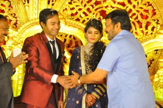 Telugu movie producer Krishna Reddy son Bhuvan Sagar Sindhusha wedding reception held at Hyderabad. Celebs like Chiranjeevi, Allu Aravind, VV Vinayak, Srinu Vaitla, Suresh Kondeti, KS Rama Rao, D Suresh Babu, KL Damodar Prasad, C Kalyan, Ali, T Prasanna Kumar, Hebah Patel, Raj Tarun and others graced the event.