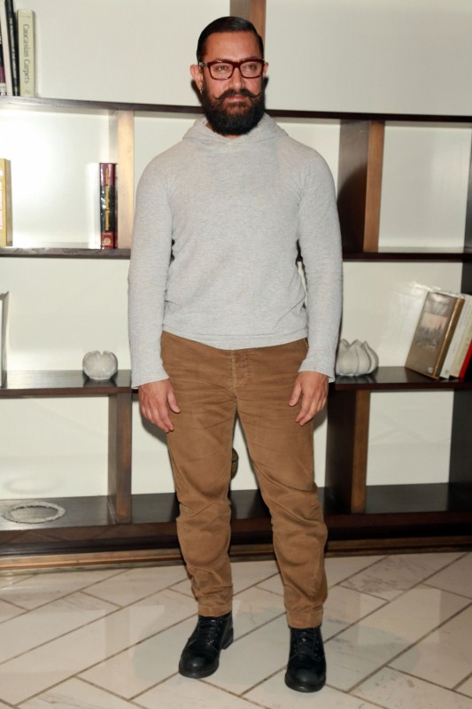 Actor Aamir Khan during a press conference to promote film "Dangal" in New Delhi on Dec 27, 2016. Zaira Wasim,Fatima Sana Shaikh,Aamir Khan,Sanya Malhotra,Suhani Bhatnagar,Dangal press conference,Dangal movie press conference,Dangal press conference pics,Dangal press conference images,Dangal press conference photos,Dangal press conference stills,Danga