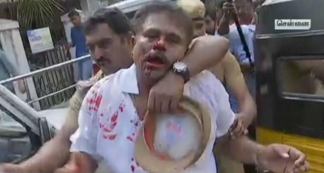 AIADMK workers attack suspended AIADMK MP Sasikala Pushpa's lawyer outside party office in Tamil Nadu.