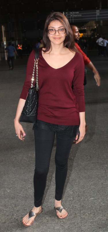 South Indian actress Kajal Aggarwal spotted at Mumbai airport. Kajal Aggarwal,Kajal Aggarwal spotted at Mumbai airport,Kajal Aggarwal at Mumbai airport,Kajal Aggarwal at airport,Kajal Aggarwal latest pics,Kajal Aggarwal latest images,Kajal Aggarwal latest photos,Kajal Aggarwal latest stills,Kajal Aggarwal latest pict