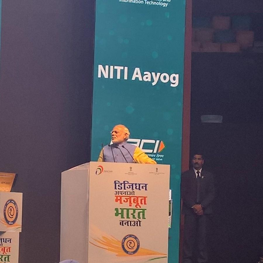 Modi said that 'Lucky Grahak Yojana' and 'DigiDhan Vyapar Yojana' were a Chrismas gift to the nation. Narendra Modi,PM Narendra Modi,PM Modi,BHIM,BHIM App,Aadhaar-based mobile payment,digital payments,digital payments app,digital transactions