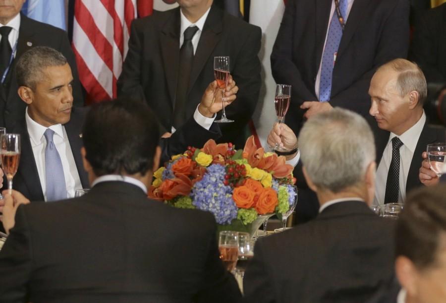 Russian President Vladimir Putin and U.S. President Barack Obama share a toast during the luncheon at the United Nations General Assembly in New York, September 28, 2015. Barack Obama and Vladimir Putin,Barack Obama,Vladimir Putin,U.S. President Barack Obama,Russian President Vladimir Putin,Obama and Putin