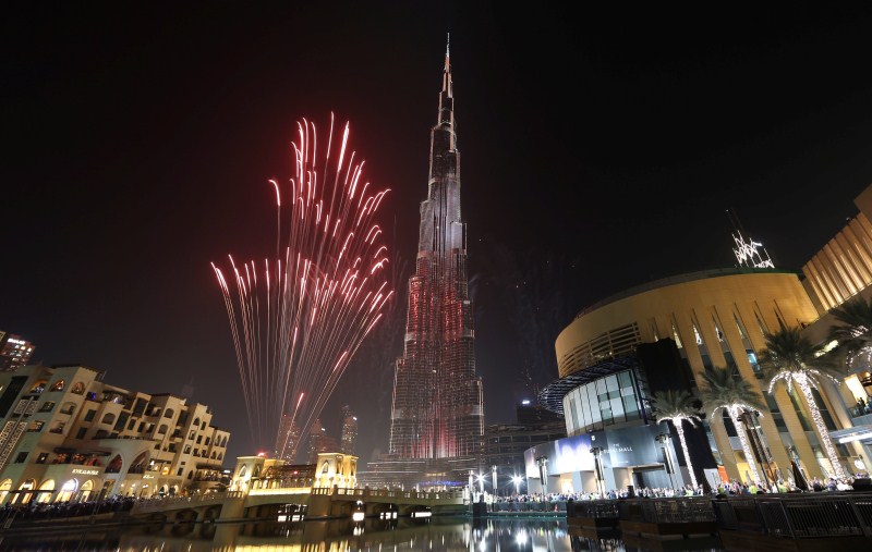 Fireworks explode around at the world's tallest building, Burj Khalifa, in Dubai during the New Year celebrations, UAE, January 1, 2017. New Year's Eve,New Year's Eve 2017,New Year Fireworks,New Year Fireworks pics,New Year Fireworks images,New Year Fireworks photos,New Year Fireworks stills,New Year Fireworks pictures