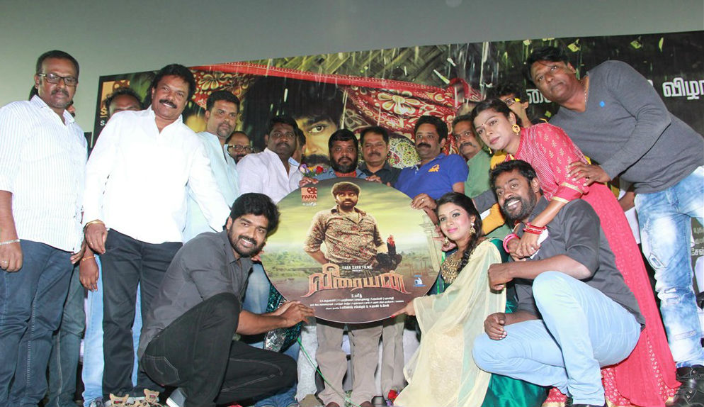 Tamil movie Veeraiyan music launch event held at Chennai. Celebs like Inigo Prabhakaran, Shaini, Aadukalam Naren, Music Director Arunagiri, Director Fareed, Cinematographer PV Murugesha, Editor Raja Mohammad, Seenu Ramasamy, Preethisha, SR Prabhakaran, A. Sarkunam, KS Thangasamy, Jaguar Thangam, SPB Saran, MS Prabhu, Kayal Vincent and others graced the event. Veeraiyan audio lunch,Veeraiyan music lunch,Inigo Prabhakaran,Shaini,Aadukalam Naren,Veeraiyan audio lunch pics,Veeraiyan audio lunch images,Veeraiyan audio lunch photos,Veeraiyan audio lunch stills,Veeraiyan audio lunch pictures