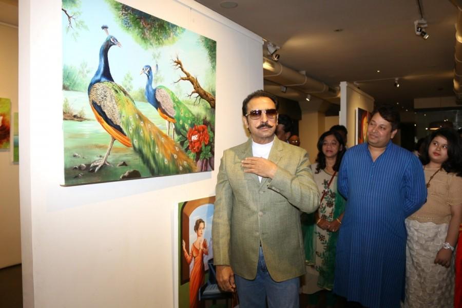 Actor Gulshan Grover during the inauguration of an exhibition Nature Redifined by artist Prasad Nagarkar in Mumbai on Jan. 2, 2016. Gulshan Grover,actor Gulshan Grover,Nature Redefine Art Exhibition,artist Prasad Nagarkar,Prasad Nagarkar,Gulshan Grover pics,Nature Redefine Art Exhibition pics,Nature Redefine Art Exhibition images,Nature Redefine Art Exhibition photos,Nature Redefine A