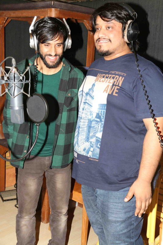 Singers Ehsan Asghar and Divya Kumar during the recording of the song Wo Jannat Ki Jagir in Mumbai on Jan. 2, 2016. Ehsan Asghar,Divya Kumar,Singers Ehsan Asghar and Divya Kumar,Wo Jannat Ki Jagir,song Wo Jannat Ki Jagir,Recording of the music album,Wo Jannat Ki Jagir music