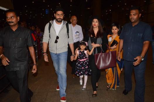Bollywood actor Abhishek Bachchan, Aishwarya Rai and Aaradhya back home after New Year Celebrations.