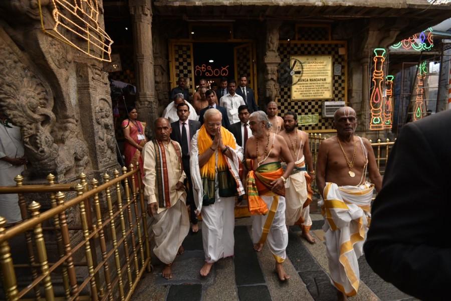 Prime Minister Narendra Modi offer prayers at the Sri Venkateswara Swamy Temple during his Tirupati visit on Wednesday. Narendra Modi offers prayers to Lord Venkateswara Swamy,Narendra Modi at Lord Venkateswara Swamy,Narendra Modi at Tirupati,Narendra Modi visits Tirupati,Narendra Modi offers prayers Tirupati,Narendra Modi offer prayers Tirupati