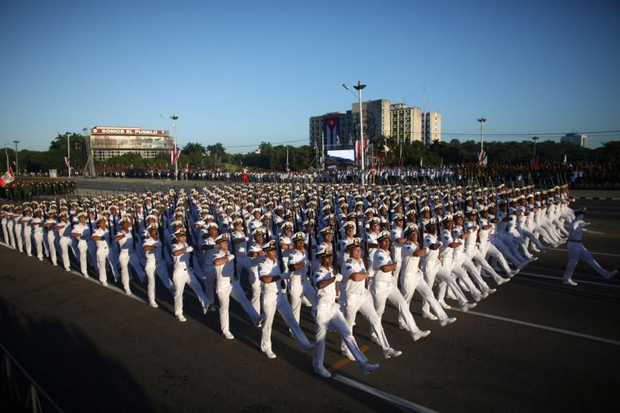 Soldiers march to mark the Armed Forces Day and commemorate the landing of the yacht Granma. Cuba,Cuba parades troops,Granma yacht,Castro brothers,60th anniversary of the landing of the Granma yacht,strength of Granma yacht,Mexico to Cuba,Armed Forces Day