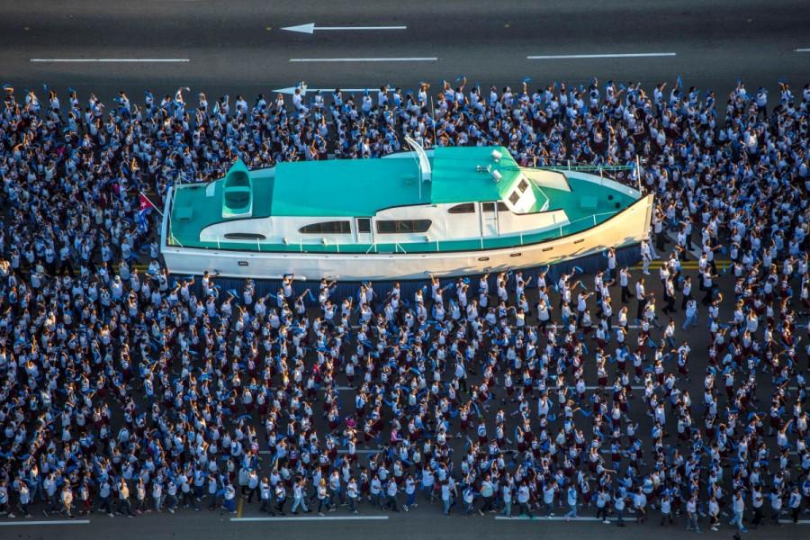 A replica of the Granma yacht passes by during the march. Cuba,Cuba parades troops,Granma yacht,Castro brothers,60th anniversary of the landing of the Granma yacht,strength of Granma yacht,Mexico to Cuba,Armed Forces Day