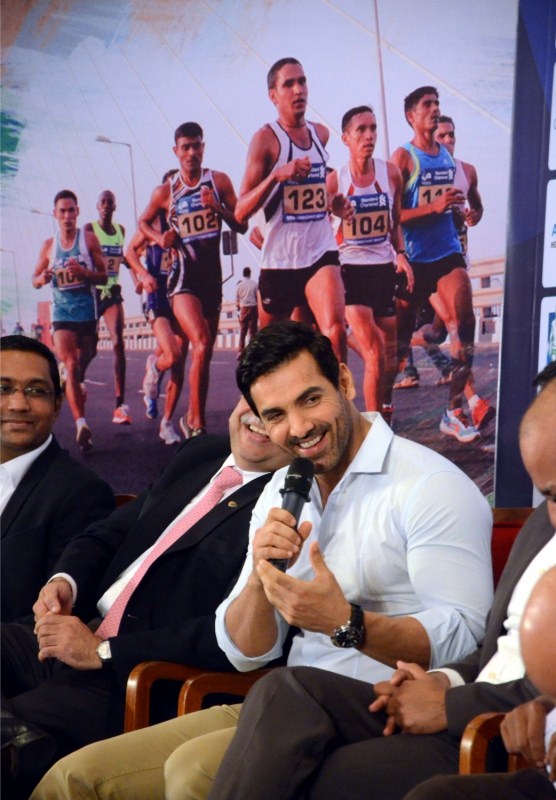 Bollywood Actor John Abraham addresses a press conference during the unveiling of the Mumbai Marathon 2017 jersey in Mumbai on Jan 5, 2017. John Abraham,actor John Abraham,Mumbai Marathon 2017 jersey,Mumbai Marathon jersey,Mumbai Marathon jersey pics,John Abraham unveils the Mumbai Marathon,John Abraham unveils the Mumbai Marathon jersey,John Abraham pics,John Abraham images,John Abraham phot