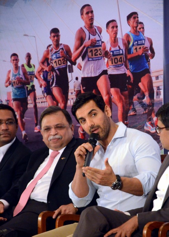 Bollywood Actor John Abraham addresses a press conference during the unveiling of the Mumbai Marathon 2017 jersey in Mumbai on Jan 5, 2017. John Abraham,actor John Abraham,Mumbai Marathon 2017 jersey,Mumbai Marathon jersey,Mumbai Marathon jersey pics,John Abraham unveils the Mumbai Marathon,John Abraham unveils the Mumbai Marathon jersey,John Abraham pics,John Abraham images,John Abraham phot