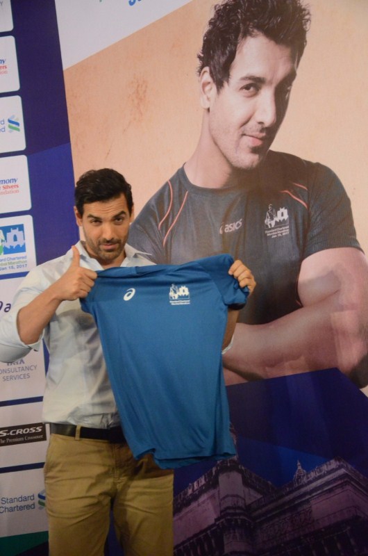 Bollywood Actor John Abraham addresses a press conference during the unveiling of the Mumbai Marathon 2017 jersey in Mumbai on Jan 5, 2017. John Abraham,actor John Abraham,Mumbai Marathon 2017 jersey,Mumbai Marathon jersey,Mumbai Marathon jersey pics,John Abraham unveils the Mumbai Marathon,John Abraham unveils the Mumbai Marathon jersey,John Abraham pics,John Abraham images,John Abraham phot