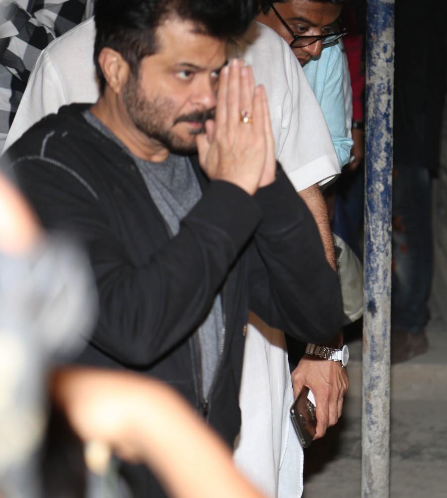 Anil Kapoor during the funeral of actor Om Puri in Mumbai on January 6, 2016. Om Puri has passed away after a massive heart attack early on Friday morning. He was 66. Om Puri Funeral,Om Puri,Om Puri Funeral pics,Om Puri Funeral images,Om Puri Funeral stills,Om Puri Funeral pictures,Amitabh Bachchan,Abhishek,Shashi Kapoor,Anil Kapoor