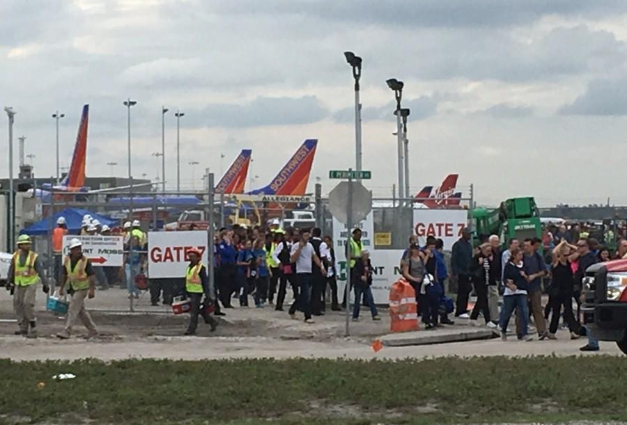 Travelers and airport workers are evacuated out of the terminal after a shooting at Fort Lauderdale-Hollywood International Airport in Florida, January 6, 2017. Fort Lauderdale airport,Shooting at Fort Lauderdale airport,Fort Lauderdale airport shooting,gunman,Fort Lauderdale-Hollywood International Airport
