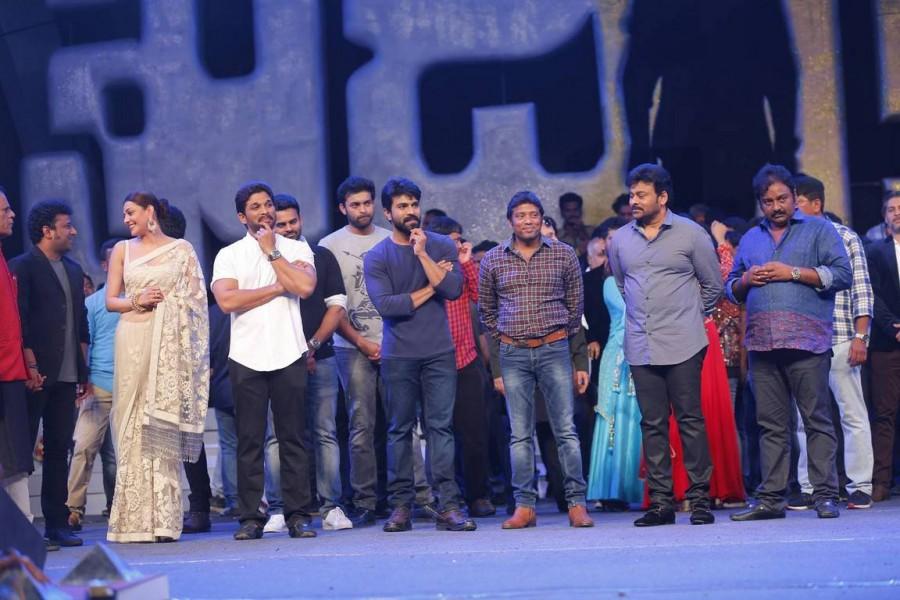 Khaidi no 150 Pre release function held at Guntur, AP. Celebs like Chiranjeevi, Ram Charan, Allu Arjun, Kajal Agarwal, Devi Sri Prasad, Allu Aravind, Surekha Konidela, A. Subashkaran, Brahmanandam, Ali and others graced the event. Chiranjeevi,Ram Charan,Allu Arjun,Khaidi no 150,Khaidi no 150 Pre release event,Khaidi no 150 Pre release function,Khaidi no 150 Pre release function pics,Khaidi no 150 Pre release function images,Khaidi no 150 Pre release function photos,Khaidi no 150 Pr