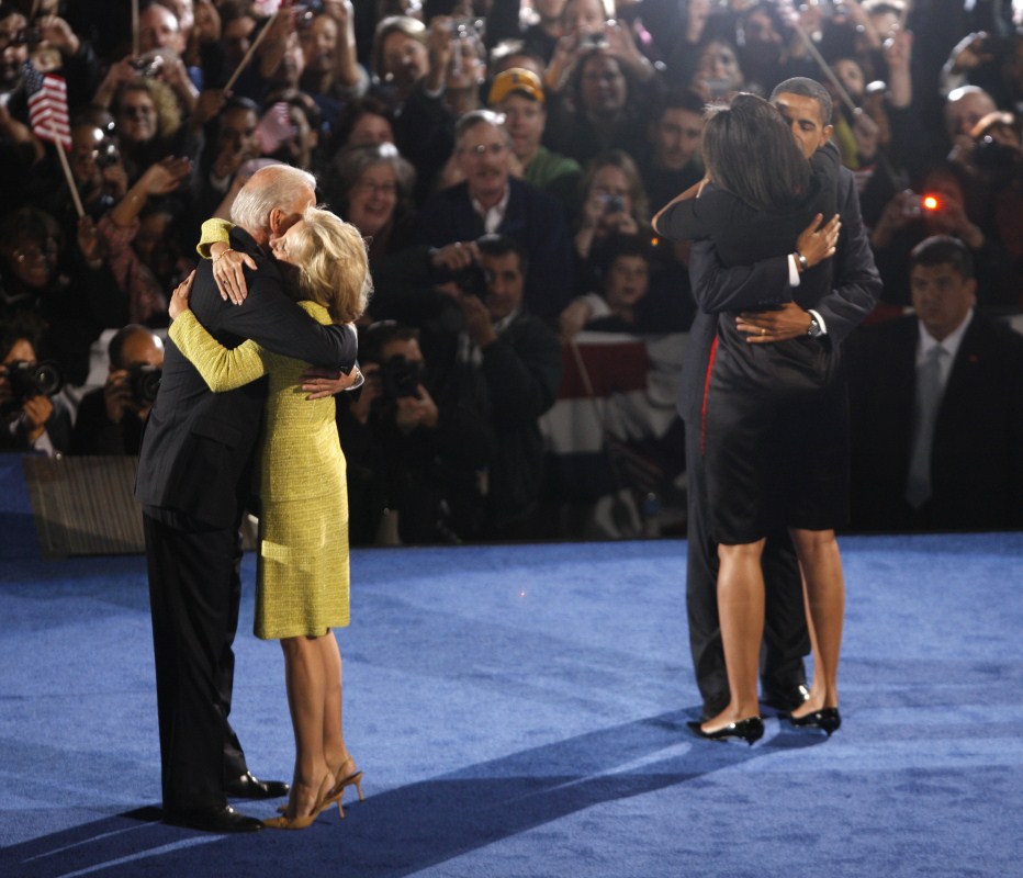 U.S. President-elect Senator Barack Obama (D-IL) (R) hugs his wife Michelle and as U.S. Vice-President-elect Senator Joe Biden (D-DE) hugs his wife Jill on stage during their election night rally in Chicago November 4, 2008. Obama captured the White House on Tuesday after an extraordinary two-year campaign, defeating Republican John McCain to make history as the first black to be elected U.S. president. Barack Obama,barack obama farewell,US President Barack Obama,Barack Obama eight years journey,Barack Obama eight years journey pics,Barack Obama eight years journey images,Barack Obama eight years journey photos,Barack Obama eight years journey stills,Bar