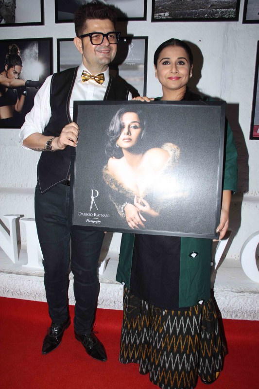 Bollywood actress Vidya Balan poses with their pics at Dabboo Ratnani calendar launch Shah Rukh Khan,Sunny Leone,Vidya Balan,Dabboo Ratnani calendar launch,Dabboo Ratnani calendar,Dabboo Ratnani calendar launch 2017,Dabboo Ratnani calendar 2017,Shah Rukh Khan at Dabboo Ratnani calendar launch,Sunny Leone at Dabboo Ratnani calendar launch,V