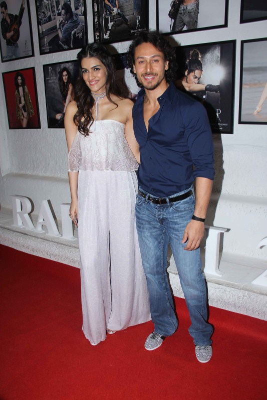 Bollywood actors Kriti Sanon and Tiger Shroff during the launch of Fashion Photographer Dabboo Ratnani’s 2017 calender in Mumbai. Govinda,AR Rahman,Tiger Shroff,Kriti Sanon,Varun Dhawan,Dabboo Ratnani,Dabboo Ratnani calendar launch,Dabboo Ratnani calendar launch pics,Dabboo Ratnani calendar launch 2017,Dabboo Ratnani calendar 2017,Dabboo Ratnani calendar launch images,Dabboo Ratnani