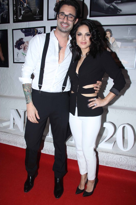 Bollywood actor Sunny Leone with her husband Daniel Weber during the launch of Fashion Photographer Dabboo Ratnani’s 2017 calender in Mumbai. Govinda,AR Rahman,Tiger Shroff,Kriti Sanon,Varun Dhawan,Dabboo Ratnani,Dabboo Ratnani calendar launch,Dabboo Ratnani calendar launch pics,Dabboo Ratnani calendar launch 2017,Dabboo Ratnani calendar 2017,Dabboo Ratnani calendar launch images,Dabboo Ratnani