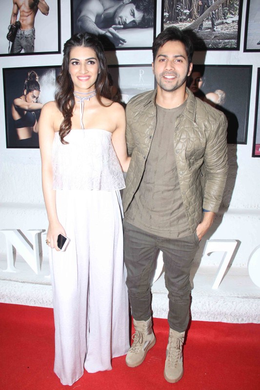 Bollywood actors Kriti Sanon and Varun Dhawan during the launch of Fashion Photographer Dabboo Ratnani’s 2017 calender in Mumbai. Govinda,AR Rahman,Tiger Shroff,Kriti Sanon,Varun Dhawan,Dabboo Ratnani,Dabboo Ratnani calendar launch,Dabboo Ratnani calendar launch pics,Dabboo Ratnani calendar launch 2017,Dabboo Ratnani calendar 2017,Dabboo Ratnani calendar launch images,Dabboo Ratnani