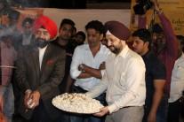 Congress leader Charan Singh Sapra and actor Manoj Bajpayee during the Lohri festival celebration in Mumbai on Jan 12, 2017.