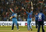 Virat Kohli and Kedar Jadhav slammed quickfire centuries to steer India to a three-wicket victory over England in the first One-Day International at the Maharashtra Cricket Association Stadium here on Sunday. Chasing a difficult 351-run target, the hosts were tottering at 63/4 when the duo came together to add 200 runs between them in 24.3 overs. India now lead the three-match series 1-0.