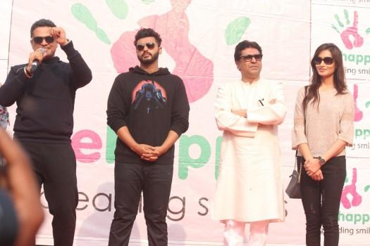 Maharashtra Navnirman Sena (MNS) president Raj Thackeray, actors Arjun Kapoor and Priya Wal during the Lokhandwala Street Festival.