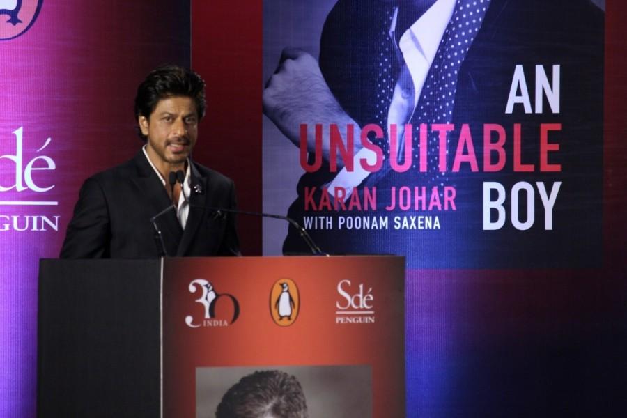 Actor Shah Rukh Khan during the launch of filmmaker Karan Johar's biography An Unsuitable Boy co-authored by Poonam Saxena in Mumbai on Jan 16, 2017. Sharukh Khan,actor Sharukh Khan,Karan Johar,Karan Johar's biography,An Unsuitable Boy,Poonam Saxena,Shah Rukh Khan,actor Shah Rukh Khan,SRK