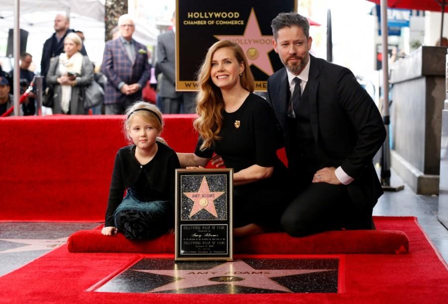 Actor Amy Adams poses by her star with husband Darren Le Gallo and daughter Aviana after it was unveiled on the Hollywood Walk of Fame in Los Angeles. Amy Adams,Amy Adams gets Hollywood Walk of Fame,Hollywood Walk of Fame,actress Amy Adams,Amy Adams pics,Amy Adams images,Amy Adams photos,Amy Adams stills,Amy Adams pictures