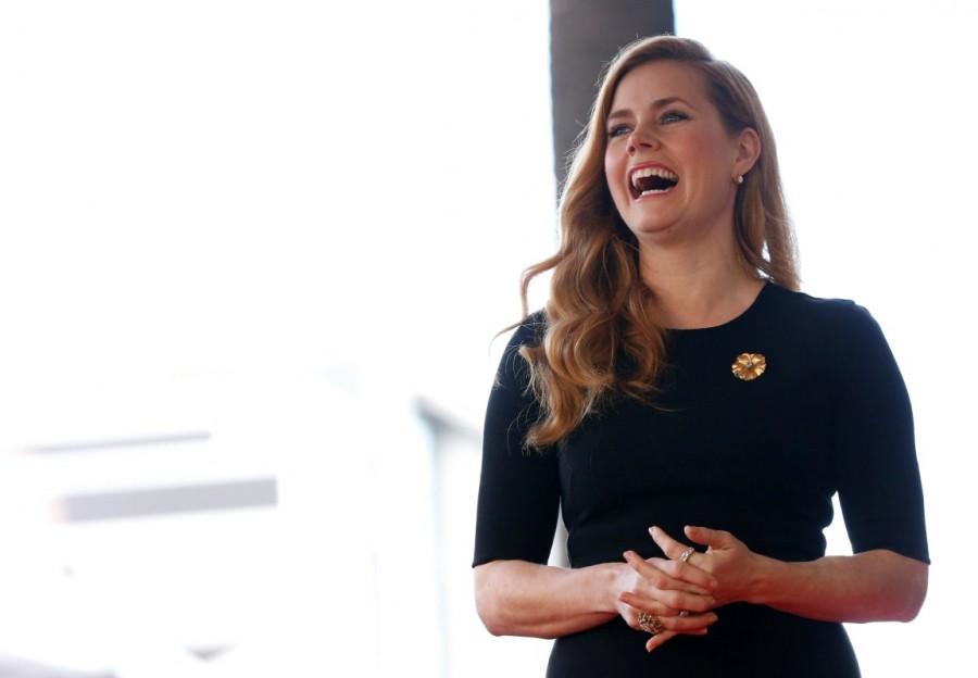Actor Amy Adams laughs before unveiling her star on the Hollywood Walk of Fame in Los Angeles. Amy Adams,Amy Adams gets Hollywood Walk of Fame,Hollywood Walk of Fame,actress Amy Adams,Amy Adams pics,Amy Adams images,Amy Adams photos,Amy Adams stills,Amy Adams pictures