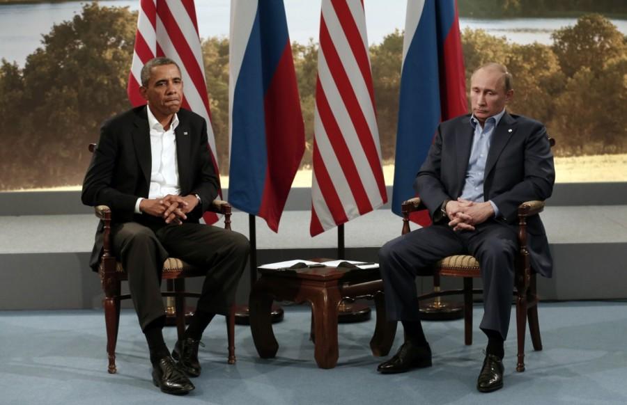 FREEZING RELATIONS WITH RUSSIA: President Barack Obama and his Russian counterpart Vladimir Putin have never had anything close to personal chemistry. From Russia's decision to grant asylum to fugitive U.S. spy agency contractor Edward Snowden to the annexation of Crimea and Russia's support for Syrian President Bashar al-Assad in Syria's civil war, a long list of grievances separate the two governments. Scrutinizing body language between the two has become a diplomatic pastime as Obama and Putin have engaged in some of the most awkward personal encounters of U.S. and Russian leaders since the end of the Cold War. Barack Obama,US president,US president Barack Obama,Barack Obama greatest moments,Barack Obama greatest moments pics,Barack Obama greatest moments images,Barack Obama greatest moments photos,Barack Obama greatest moments stills,Barack Obama greatest momen