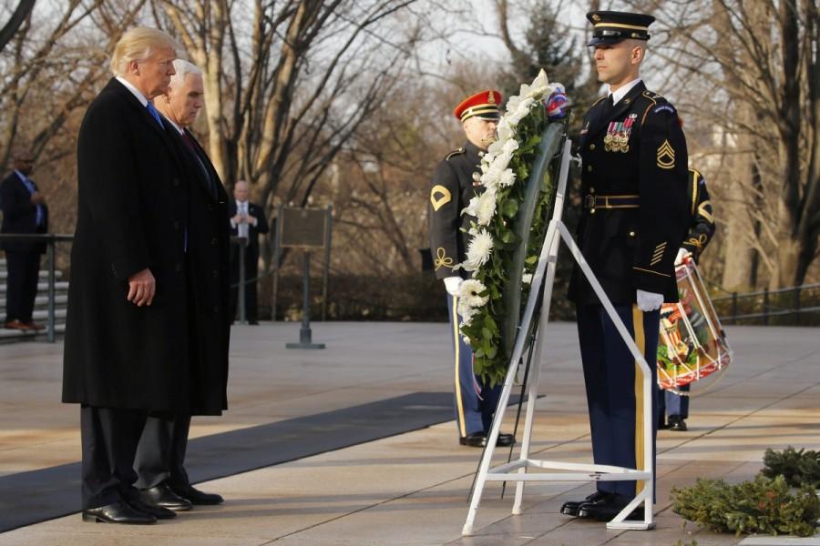 U.S. President-elect Donald Trump and Vice President-elect Mike Pence participate in a wreath laying ceremony at the Tomb of the Unknowns in Arlington National Cemetery outside Washington, U.S., January 19, 2017, one day before Trump's inauguration as the nation's 45th president. Donald Trump,Mr. Trump,Donald Trump at Washington,President-elect Mr. Trump