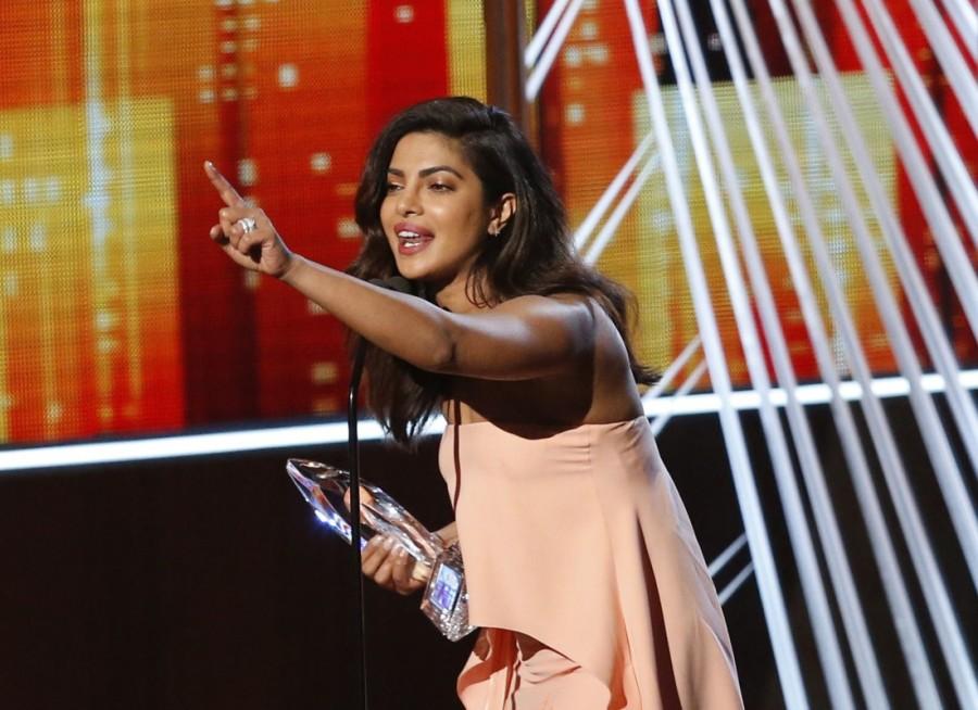Actress Priyanka Chopra accepts the award for favorite TV Drama Actress at the People's Choice Awards 2017 in Los Angeles, California, U.S., January 18, 2017. Priyanka Chopra,People's Choice Award,Quantico,TV Drama,TV Drama Actress,People's Choice Awards 2017,actress Priyanka Chopra,Priyanka Chopra pics,Priyanka Chopra images,Priyanka Chopra stills,Priyanka Chopra pictures