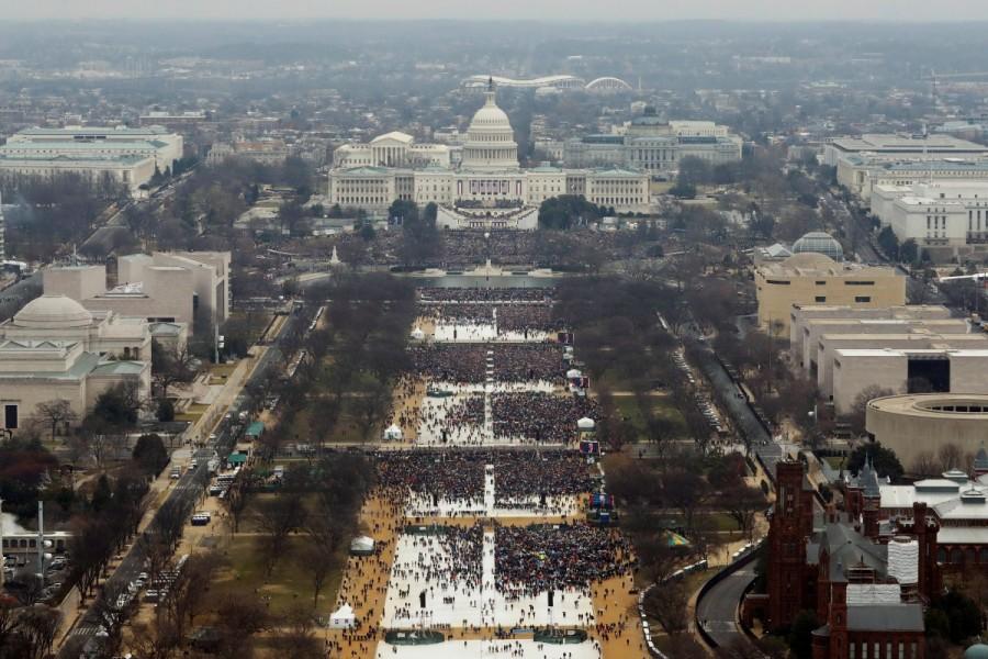 Attendees partake in the inauguration ceremonies. Donald Trump,Presidential inauguration,Donald Trump inauguration,45th president of America,Donald Trump as 45th president of America,Donald Trump inauguration pics,Donald Trump inauguration images,Donald Trump inauguration photos,Donald Trump inauguration