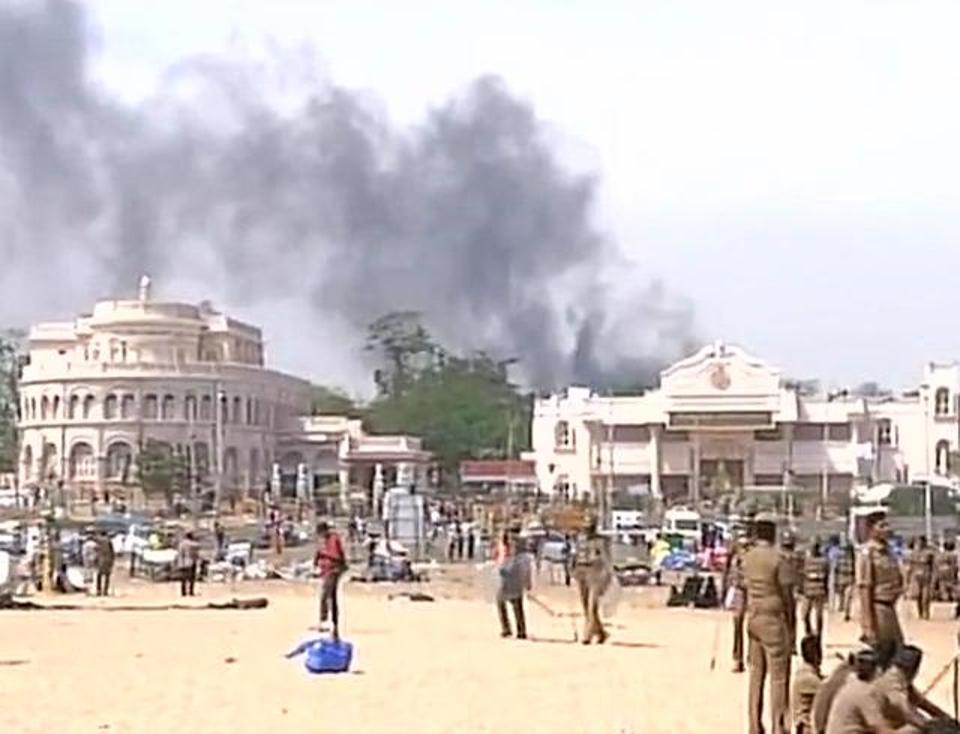 The Jallikattu protest that remained peaceful for a week in Tamil Nadu turned violent with demonstrators throwing stones at police following eviction action against them at the Marina beach here. In a street in Triplicane area near Marina beach, protesters in large numbers threw stones at police which later retaliated with a baton charge. Jallikattu protesters turn violent,protesters turn violent,Jallikattu protest,Ice House,Marina beach,Makkal movement,fire near Ice House,Jallikattu protest pics,Jallikattu protest images,Jallikattu protest photos,Jallikattu protest stills,Jallikattu prote