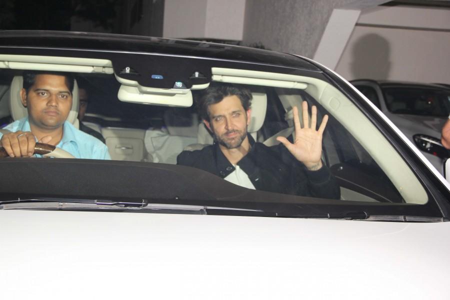 Hrithik Roshan snapped post party at Rakesh Roshan's house Rakesh Roshan,Hrithik Roshan,Sussanne Khan,Yami Gautam,Resul Pookutty,Shadia Pookutty,Ravi Behl,Salim Merchant,Sulaiman Merchant,Yami Gautam