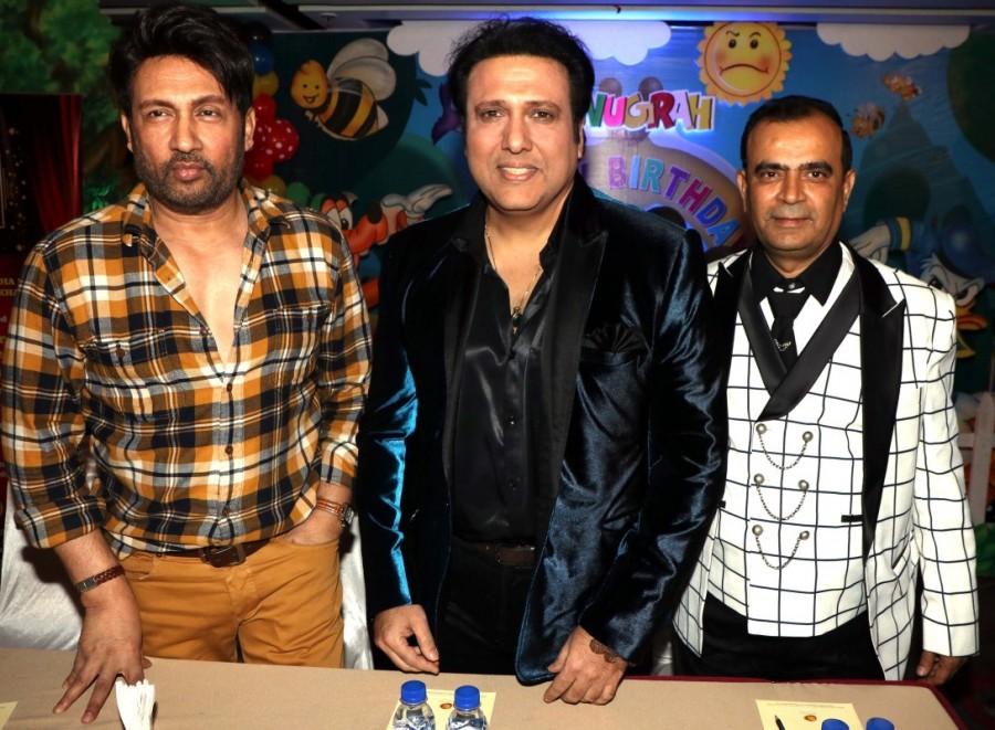 Bollywood actors Shekhar Suman and Govinda during the unveiling of 3rd Bright Award Trophy in Mumbai. Govinda,Sonu Sood,Shekhar Suman,Shailesh,Yogesh Lakhani,3rd Bright Award,Peninsula Grand Hotel
