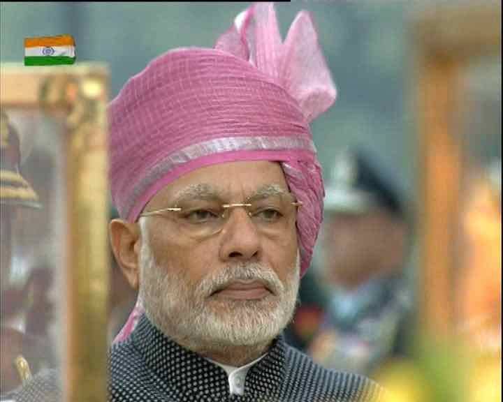 After laying the wreath, Modi observed a two-minute silence to pay tribute to the fallen soldiers. Republic Day 2017,Republic Day,PM Narendra Modi,Narendra Modi,Amar Jawan Jyoti,India Gate,Republic Day celebrations,Republic Day celebrations pics,Republic Day celebrations images,Republic Day celebrations photos,Republic Day celebrations stills