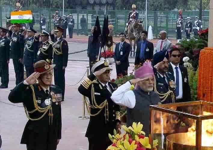 Republic Day 2017: PM Narendra Modi pays tribute at Amar Jawan Jyoti. Republic Day 2017,Republic Day,PM Narendra Modi,Narendra Modi,Amar Jawan Jyoti,India Gate,Republic Day celebrations,Republic Day celebrations pics,Republic Day celebrations images,Republic Day celebrations photos,Republic Day celebrations stills