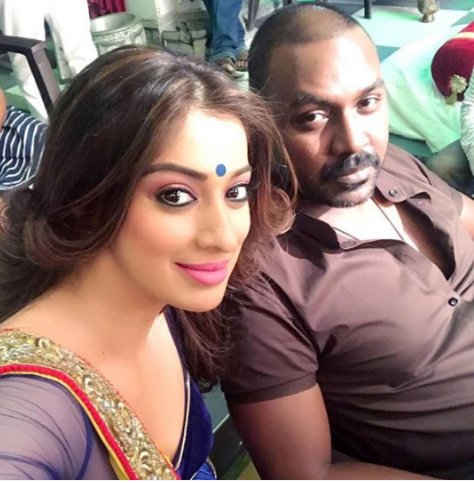 Actor Raghava Lawrence and actress Raai Laxmi on sets of Motta Shiva Ketta Shiva Item song shoot. Raghava Lawrence,Raai Laxmi,Raghava Lawrence and Raai Laxmi,Motta Shiva Ketta Shiva,Motta Shiva Ketta Shiva Item song,HaraHaraMahadev song,Hara Hara Mahadev song