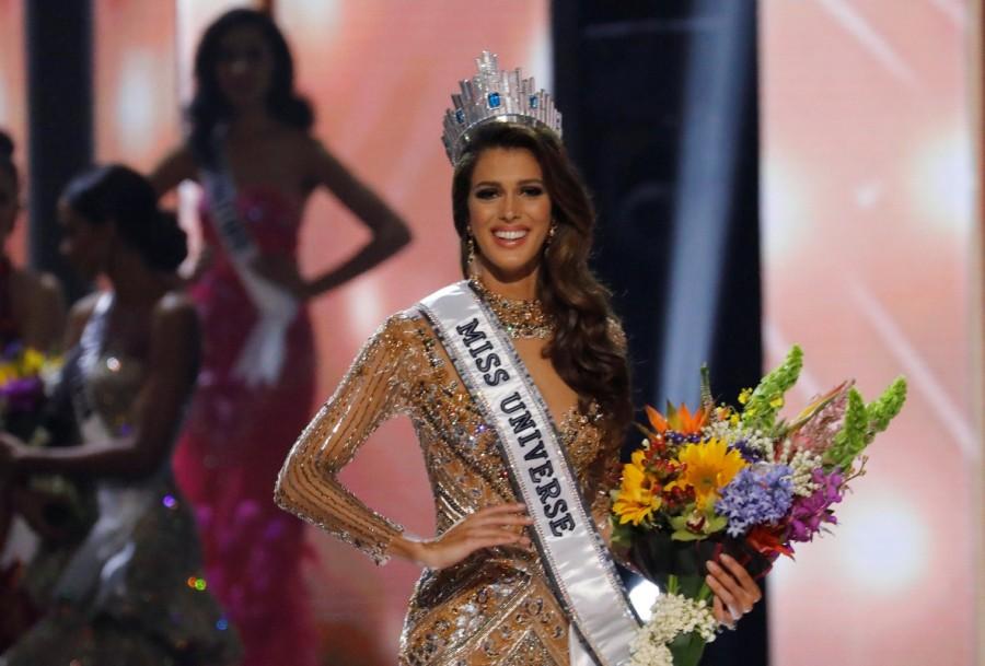 Miss France took her first walk as Miss Universe 2016 as she was announced the winner by host Steve Harvey at Mall of Asia Arena in Philippines. India's Roshmitha Harimurthy couldn't even make it to the top 15. Miss Universe 2015 Pia Wurtzbach crowned the 23-year-old Iris Mittenaere who was born in northern French town of Lille. Iris Mittenaere,Iris Mittenaere Crowned Miss Universe 2016,Miss Universe 2016,Miss Universe,miss universe 2016 winner,miss universe 2016 photos,Miss Universe 2016 pics,Iris Mittenaere pics,Iris Mittenaere images,Iris Mittenaere photos,Iris Mittenaere stil