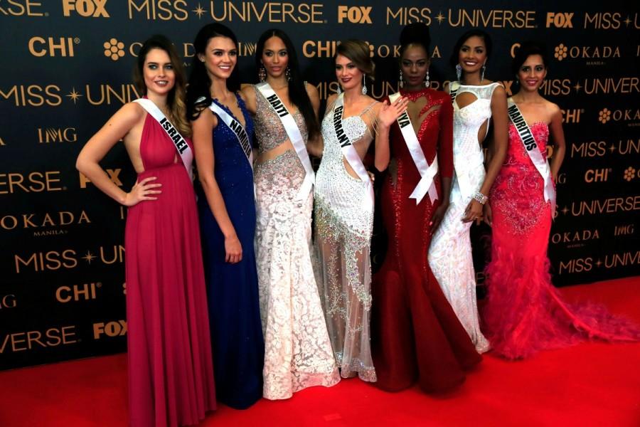 Miss Universe candidates pose for a picture during a red carpet inside a SMX convention in metro Manila, Philippines January 29, 2017. In Photo from L-R: Miss Israel Yam Kaspers Anshel, Miss Namibia Lizelle Esterhuizen, Miss Haiti Raquel Pelissier, Miss Germany Johanna Acs, Miss Kenya Mary Esther Were, Miss Jamaica Isabel Dalley and Miss Mauritius Kushboo Ramnawaj. Iris Mittenaere,Iris Mittenaere Crowned Miss Universe 2016,Miss Universe 2016,Miss Universe,miss universe 2016 winner,miss universe 2016 photos,Miss Universe 2016 pics,Iris Mittenaere pics,Iris Mittenaere images,Iris Mittenaere photos,Iris Mittenaere stil