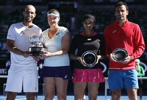 Abigail Spears of the U.S. and Colombia's Juan Sebastian Cabal pose with their trophy after winning their Mixed doubles final match against India's Sania Mirza and Croatia's Ivan Dodig.