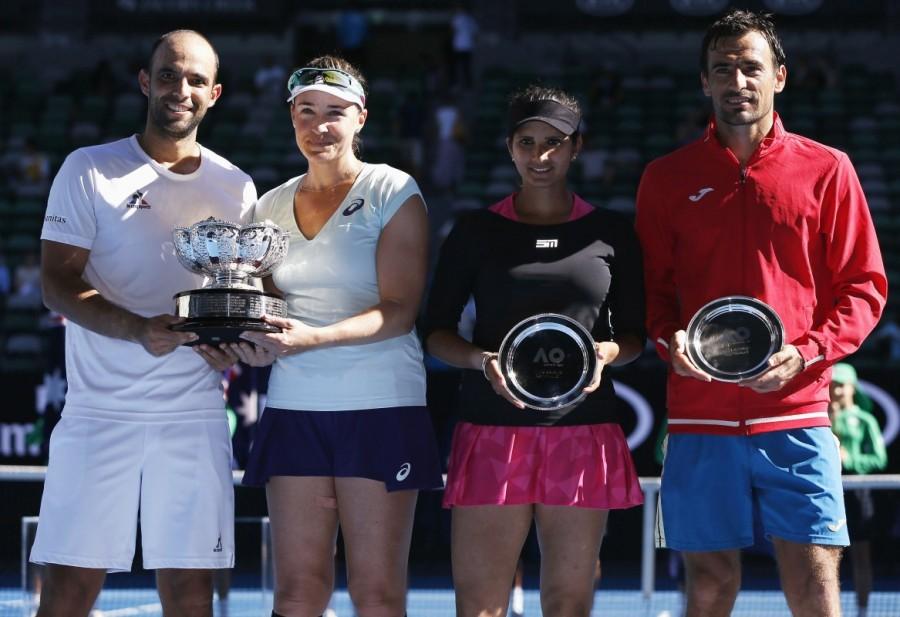 Abigail Spears of the U.S. and Colombia's Juan Sebastian Cabal pose with their trophy after winning their Mixed doubles final match against India's Sania Mirza and Croatia's Ivan Dodig. Australian Open,Australian Open 2017,Abigail Spears-Jan Sebastian Cabal,Abigail Spears,Jan Sebastian Cabal,Saina Mirza-Ivan Dodig,Saina Mirza,Ivan Dodig,mixed doubles final