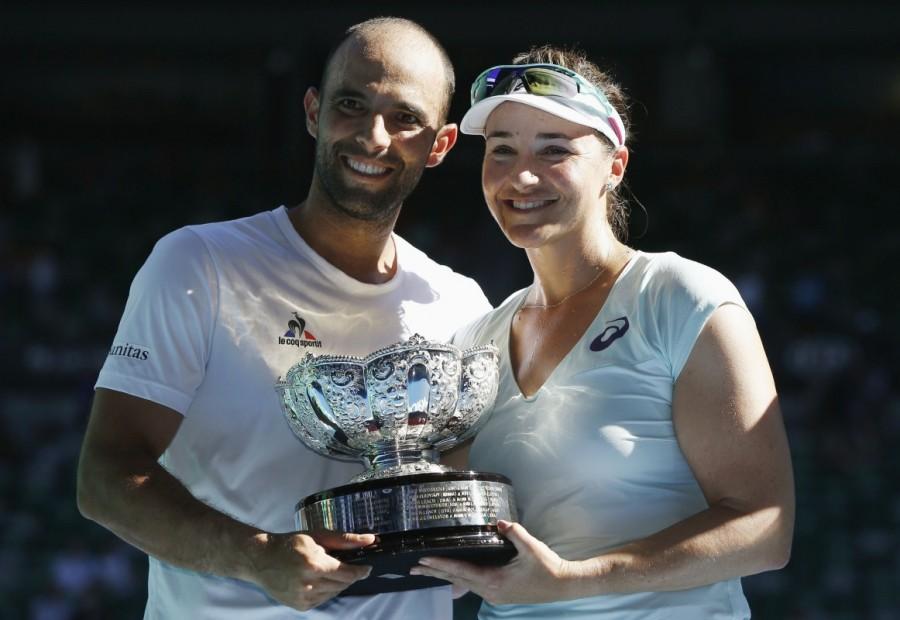 Abigail Spears of the U.S. and Colombia's Juan Sebastian Cabal hold their trophy after winning their Mixed doubles final match against India's Sania Mirza and Croatia's Ivan Dodig. Australian Open,Australian Open 2017,Abigail Spears-Jan Sebastian Cabal,Abigail Spears,Jan Sebastian Cabal,Saina Mirza-Ivan Dodig,Saina Mirza,Ivan Dodig,mixed doubles final