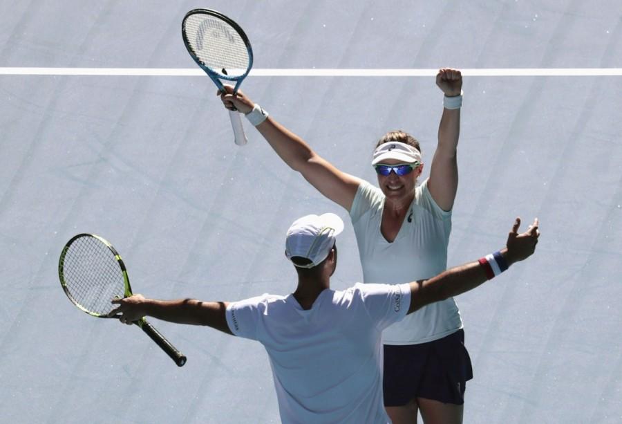 Abigail Spears of the U.S. and Colombia's Juan Sebastian Cabal celebrate winning their Mixed doubles final match against India's Sania Mirza and Croatia's Ivan Dodig. Australian Open,Australian Open 2017,Abigail Spears-Jan Sebastian Cabal,Abigail Spears,Jan Sebastian Cabal,Saina Mirza-Ivan Dodig,Saina Mirza,Ivan Dodig,mixed doubles final